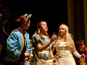 Sarah Damen (centre) as Alice rehearses with her fellow student castmates for St. Michael Catholic Secondary School's upcoming production of Alice in Wonderland, which will run at 6:30 p.m. each night from Dec. 11-15 at the high school.