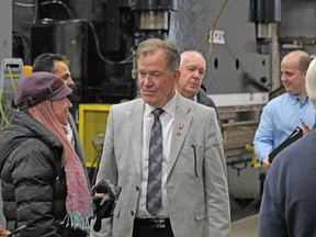 Timmins MPP and Ontario's Minister of Mines George Pirie meets with constituents at NPLH Drilling on Friday.