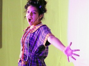 Emi performs as Miss Hannigan.