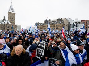 Pro-Israel protestors are seen during a pro-Israel protest on Parliament Hill in Ottawa, on Monday, Dec. 4, 2023.