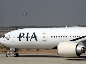 A state-run Pakistan International Airlines (PIA) plane taxies before take-off from Karachi International Airport in Karachi on April 21, 2010.