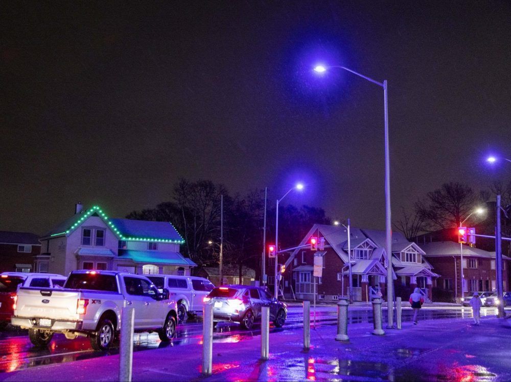 City hall working to fix streetlight defect casting purple hue over