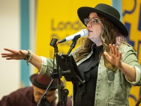 Laura Gagnon performs with her dad Paul at a TD Music Mondays concert at the London Public Library Central branch on Monday, Dec. 4, 2023. (Mike Hensen/The London Free Press)