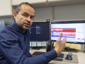 Dr. Bekim Sadikovic shows a screen displaying epigenetic data from hundreds of test and control subjects at his lab at Victoria Hospital in London on Tuesday, Dec. 12, 2023. Sadikovic is using machine learning to categorize rare diseases by using their epigenetic markers in a person's DNA.  (Mike Hensen/The London Free Press)