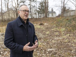 Darryl Torhjelm of London stands on the lot where he demolished an old home on Cooper Street, near Oxford Street and Wharncliffe Road in London, and plans to build a new one. Photo taken on Friday Dec. 22, 2023. Mike Hensen/The London Free Press