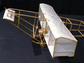 P1320299 – Model of one of early biplanes designed, manufactured, and flown by Dr. William Greene – Peace River Museum, Archives and Mackenzie Centre collection. The San Francisco-born aviation pioneer rivalled Wright Brothers and Glenn Curtiss for many aviation firsts. Greene, according to 1910 New York Sun, was one of first eight men to fly. He, wife Evangeline, and daughter, Ursula, moved to Peace River after his time in Second U.S. Army Air Service during First World War. Here, he established a dental practice. Few, if any, residents knew he was also a physician and engineer, let alone a vaunted aviator.