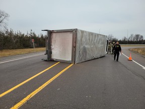 Ontario Provincial Police on the scene of a transport truck rollover on the eastbound Highway 401 on/off ramps Friday morning.