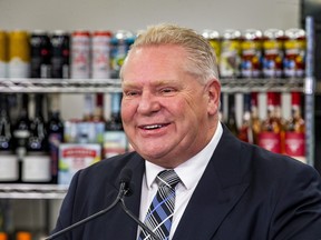 Ontario Premier Doug Ford addresses media at Circle K convenience store in Etobicoke on Thursday December 14, 2023. Premier Ford, along with Peter Bethlenfalvy, Minister of Finance, announced an expansion in alcohol sales in Ontario starting January 1, 2026.