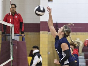 Abbey Benedek of the Assumption Lions spikes the ball during an AABHN senior girls volleyball game against the Pauline Johnson Thunderbirds on Monday December 11, 2023 in Brantford, Ontario. Brian Thompson/Brantford Expositor/Postmedia Network