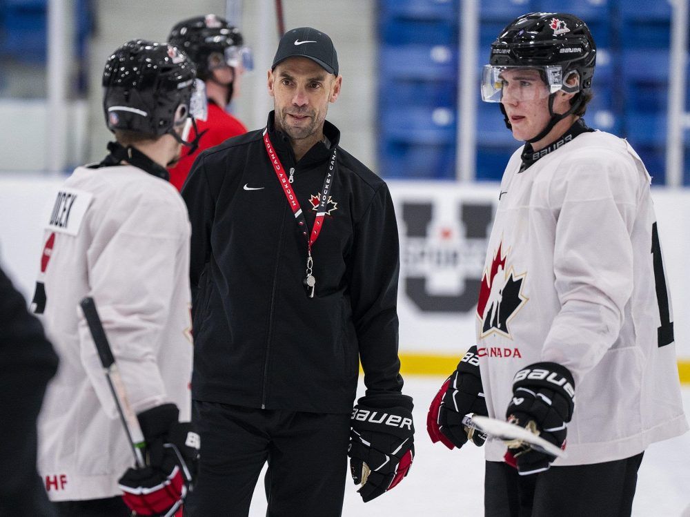 Letang's winding path leads him behind Team Canada bench at world