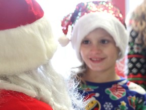 Six-year-old Makayla Kingdon was smiling inside Suzy's Ice Creamaporium in Point Edward Saturday.