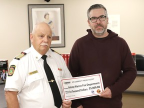 Markstay-Warren Fire Chief Mark Whynott, left, and Matthew Watson, Enbridge Gas operations supervisor for the northeast region, take part in a presentation at the municipal office in Markstay, Ont.