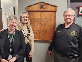 Norfolk County Public Library recently celebrated the opening of its new Simcoe Lions Norfolk County History Centre, located on the second floor of the Simcoe branch.  From left are Julie Kent, CEO of Norfolk County Public Library, Norfolk Mayor Amy Martin, and Ron Keba, past-president of the Simcoe Lions Club.  SUBMITTED