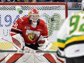 Owen Sound Attack goalie Carter George makes a save during their game against the London Knights at Budweiser Gardens in London, Ontario on Friday December 15, 2023. Photo by Derek Ruttan/London Free Press/Postmedia Network