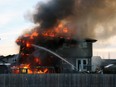 Whitecourt Fire Department members responded to a duplex fire near Wellwood Drive, visible from the corner of Flats Connector and Mink Creek on Nov. 9. One life was lost in the devastating event.