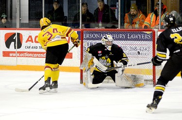 Timmins Rock forward Lucas Lowe first a shot past Kirkland Lake Gold Miners goalie Graydon Mole for the first of his three goals during the first period of Friday night’s NOJHL contest at the McIntyre Arena. Lowe’s hat-trick — the first of his Junior ‘A’ career — helped the Rock post a 13-2 win over the Gold Miners. THOMAS PERRY/THE DAILY PRESS