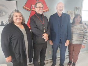 Shelley Francis, left, director of the Mawlugutineg Mental Wellness team, Natoaganeg Chief George Ginnish, cabinet minister Réjean Savoie and Cheryl Ward, director of the development centre