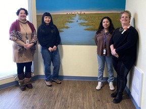 Chatham-Kent Community Health Centre at Walpole Island recently unveiled a new mural. From left are Julia Dyer, manager of clinical and client services, Ariel Williams, artist, Wahbzii Shognosh-Diaz, traditional healing community outreach worker, and Sherri Saunders, CKCHC executive director. (Handout)