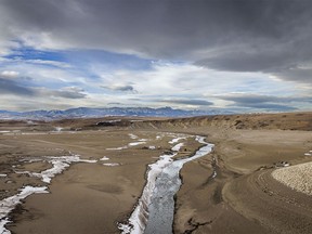 Looking northwest along the Crowsnest River valley where the river enters the nearly-dry Oldman Reservoir north of Cowley, Ab., on Monday, December 18, 2023.