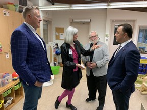 MPP Will Bouma, left watched as Lansdowne Children's Centre executive director Rita-Marie Hadley and board chair John Bradford showed Michael Parsa, the Minister of Children, Community and Social Services around one of the engagement rooms in the facility.