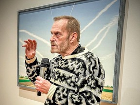 The late Leonard Jubenville is seen here speaking to those attending a retrospective of his art work, held at the Thames Art Gallery in January 2023. (Karen Robinet photo)