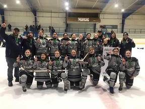 The Chatham-Kent Crush celebrate after winning the U13 BB division at the International Silver Stick championship in Sarnia, Ont., on Sunday, Jan. 7, 2024. Team members are, front row, left: Bailey Williams, Kasey Holmes, Hannah Heinhuis, Casey Horak, Kate Knotek, Brylee Ovecka and Kendall Dietrich. Back row: coach Randy Dietrich, coach Derek Holmes, Brooklyn Pearce, Kayonah Soney, Azlynn Soney, Layne Mason, Emmerson Denure, Lily Jack, Mackenna Demaeyer, coach Jesse Soney, Jill Tope, trainer Alicia Blonde and trainer Melissa Demaeyer. (Supplied Photo)