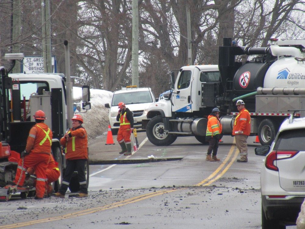 Utilities Kingston truck falls into sinkhole on Sydenham Road