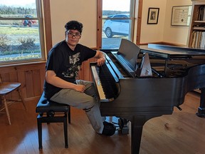 Mason Animikwan lives and breathes for music and here he is happy at the piano. For this young man's future, we lovingly say "stay tuned." Supplied