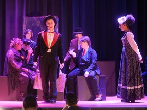 Delhi District Secondary School's Victoria Price, centre, is Harry Houdini in The Last Illusion, a play about the life and death of The Great Houdini. CHRIS ABBOTT