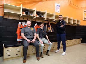 From left to right, Owen Sound North Stars junior B players Myles Playter and Bryce Martin, along with general manager Ethan Woods, are pictured inside the newly renovated Owen Sound North Stars dressing room at the Harry Lumley Bayshore Community Centre. Greg Cowan/The Sun Times