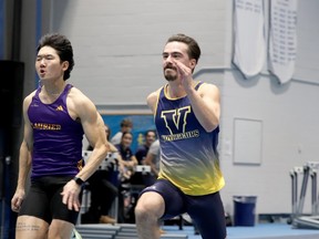 Skyler Savage-Perreault, right, competes for the Laurentian Voyageurs in the men’s 60-metre race at the Hal Brown Memorial meet in Toronto.