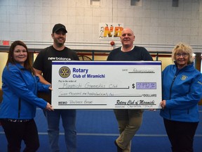 The Rotary Club of Miramichi presented a donation of $7,992.50 to the Miramichi Gymnastics Club Tuesday at the Golden Hawk Recreation Centre for the club's new gymnastics beam. On hand for the presentation were (from left): Rotary membership chair Tara Racette, gymnastics club fundraising chair Jason LeBlanc, Rotary sergeant-at-arms Kevin Forgrave, and Rotary vice-president Catherine Flett.