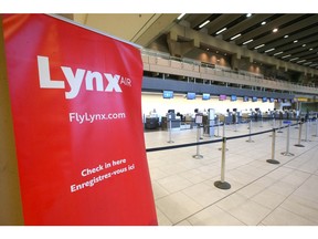 A deserted Lynx Air check in desk is shown at the Calgary International Airport on Friday, February 23, 2024.