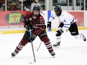 Chatham Maroons' Josh Cleary is chased by London Nationals' Peter Fagan on a breakaway in the third period at Chatham Memorial Arena on Sunday, Jan. 21, 2024. (Mark Malone/Chatham Daily News)