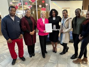 Members of Fort Black Society pose with Mayor Katchur at the Feb. 1 proclamation of Black History Month.