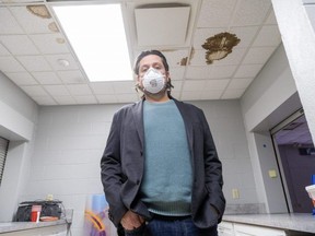 Craig Ashby, manager of facility services for the London Public Library, stands in the water- and mould-stained community kitchen at the Beacock library branch on Huron Street in London on Tuesday, Feb. 6, 2024. (Derek Ruttan/The London Free Press)