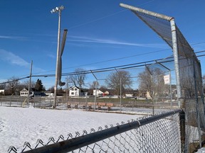 A closed softball diamond at Cloverdale Park sits empty on Tuesday,