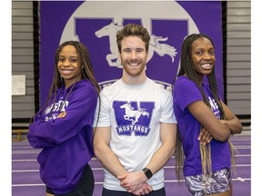 Sprinters Vivian Ogor, left, Aaron Thompson and Favour Okpali are part of a Western Mustangs track and field team that's been a point-scoring machine this indoor season. Photo taken on Wednesday, Jan. 31, 2024. (Derek Ruttan/The London Free Press)