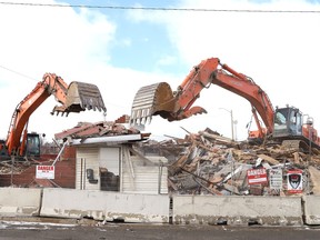 Buildings on Shaughnessy Street across from the firehall were being demolished by Lacroix Construction in Sudbury, Ont. on Monday February 12, 2024.