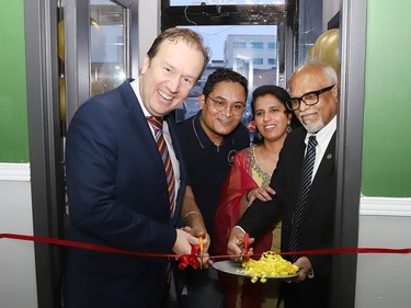 Greater Sudbury Mayor Paul Lefebvre, left, Anvesh Pallabhatla and his wife, Shikha Bhanwala, of J&M Indian Cuisine, and Dr. Rayudu Koka take part in a ribbon cutting for the grand opening of the restaurant at 2037 Long Lake Road unit 3, in Sudbury, Ont. on Tuesday, February 20, 2024. J&M Indian Cuisine is a fusion of North and South India. The restaurant is open Wednesday to Monday from 11 a.m. to 9:30 p.m. To learn more and to see the menu, go to jjmindiancuisine.com. John Lappa/Sudbury Star/Postmedia Network