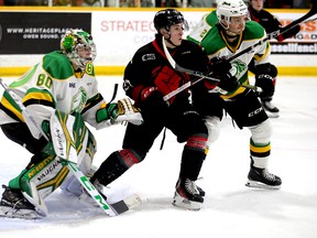 From left to right, Owen Willmore, Antonio Tersigni and Alec Leonard prepare for a shot from the point in the first period as the Owen Sound Attack host the London Knights inside the Harry Lumley Bayshore Community Centre on Saturday, Feb. 3, 2024. Greg Cowan/The Sun Times