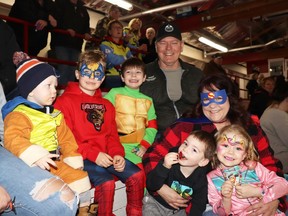 Disguised for Superhero Night were (back, l-r) Cayson and Cohen Corley-Smith, both as Wolverine, Gannon Plummer as Raphael the Ninja Turtle, and Ken Jodry; and (front) Leslee Jodry as Superman, Gracin Plummer, and Calee Corley-Smith as a PAW Patrol character. Superhero Night was held during the Whitecourt Wolverines' game with the Bonnyville Pontiacs on Friday night. The event raised funds for Defeat Duchenne Canada, which supports Duchenne muscular dystrophy research.