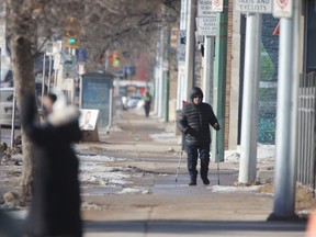 A bright sunny day, and unseasonably warm weather, has melted much of the snow and ice off of sidewalks and roads in Winnipeg on Friday, Feb. 2, 2024.