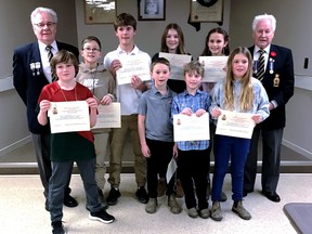 There were eight winners over all at the Royal Canadian Legion Branch 92 Public Speaking Competition on February 18. Rear, Branch President Bob Howard, Denver Marshall (intermediate first place winner), Brendan Lanigan (intermediate second place), Ivy Zufelt McCulloch (first place junior), Elizabeth Bishop (third place junior), Sergeant at Arms John Robertson; front, Max Doogan (second place junior), Oakley Tregunna (first place primary), Reid Martin (third place primary), and Olivia Zorzitto (second place primary). supplied by Royal Canadian Legion Branch 92