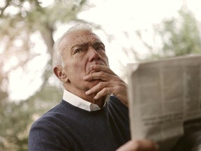 illustration - older man reading a newspaper