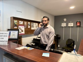 Florencville Inn owner Abdul Moaz answers the phone