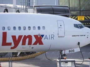 A Lynx Air Boeing 737 jet sits at a gate at Calgary International Airport on Feb. 23. (THE CANADIAN PRESS/Todd Korol)
