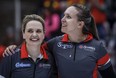 Team Ontario-Homan skip Rachel Homan, right, celebrates with vice-skip Tracy Fleury after defeating Team Manitoba-Jones in the final at the Scotties Tournament of Hearts in Calgary on February 25, 2024.