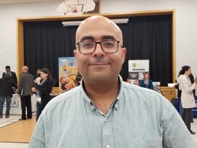 Mohamed Hamed looked for work at the Organization of Canadian Nuclear Industries job fair in Owen Sound, Ont. on Wednesday, March 27, 2024. (Scott Dunn/The Sun Times/Postmedia Network)