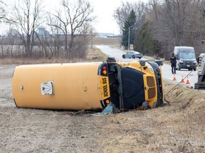 A school bus carrying 40 students crashed at a rural intersection in Oxford County shortly after 8 a.m. on Tuesday March 5, 2023. Several kids were taken to hospital, though none of their injuries was considered life-threatening. (Derek Ruttan/The London Free Press)